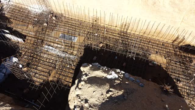 Do you know why rebar is so important? Concrete is incredibly strong in compression — meaning it handles heavy loads pushing downward extremely well. But concrete is weak in tension caused by pulling, bending, vibration, shifting soil, and temperature changes.
That’s where rebar comes in.
Rebar handles the tensile forces while concrete handles the compressive forces. Together, they form reinforced concrete — allowing structures to withstand loads, movement, and time.
Without rebar, concrete can crack far more easily and may fail under bending or shifting loads.
These rebar cages are carefully designed by structural engineers. The spacing, diameter, overlap lengths, hooks, and placement all play a critical role in:
• load distribution
• crack control
• seismic performance
• durability
• settlement resistance
Creating a giant hand-drawn sketch floating in space before it disappears forever into concrete.